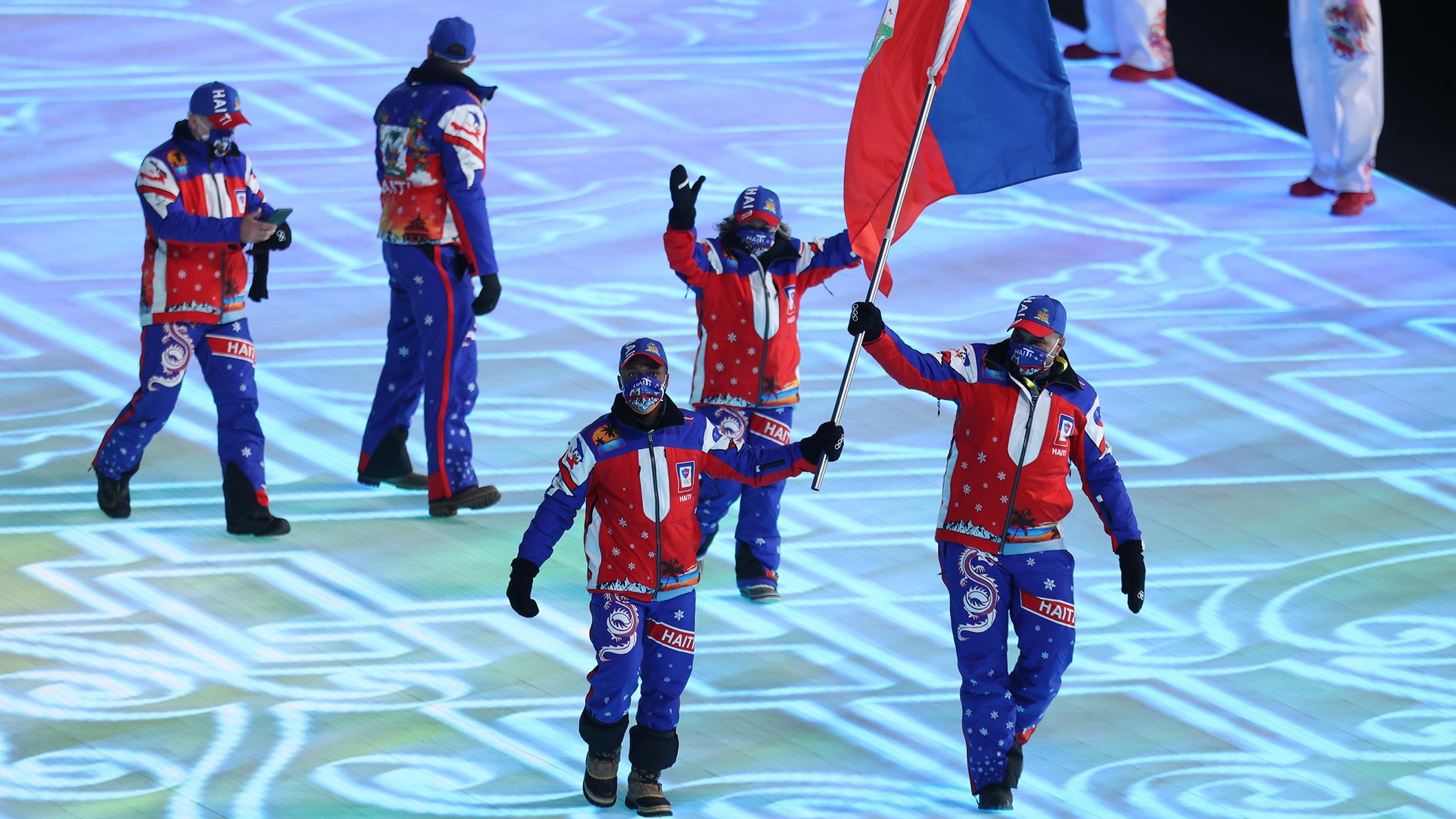 Flag bearer Richardson Viano of Team Haiti carries their flag during the Opening Ceremony of the Beijing 2022 Winter Olympics at the Beijing National Stadium on February 04, 2022 in Beijing, China. 
