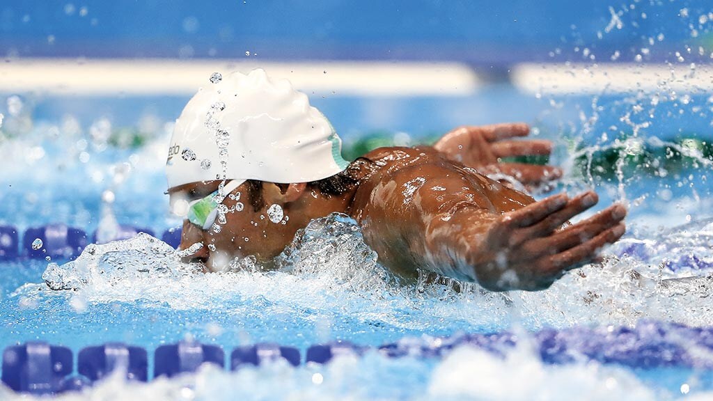 Rami Anis of the Refugee Olympic Team competes in Men's 100m Butterfly heat on Day 6 of the Rio 2016 Olympic Games at the Olympic Aquatics Stadium on August 11, 2016 in Rio de Janeiro, Brazil.  (Photo by Elsa/Getty Images)